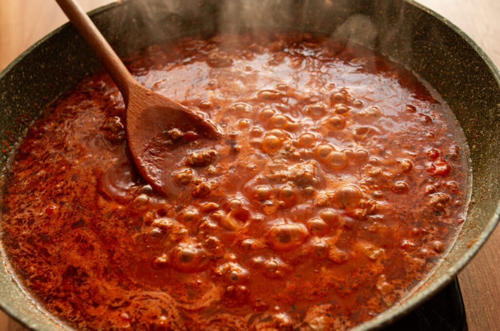 Bolognese Sauce Recipe cooking in Pan skillet